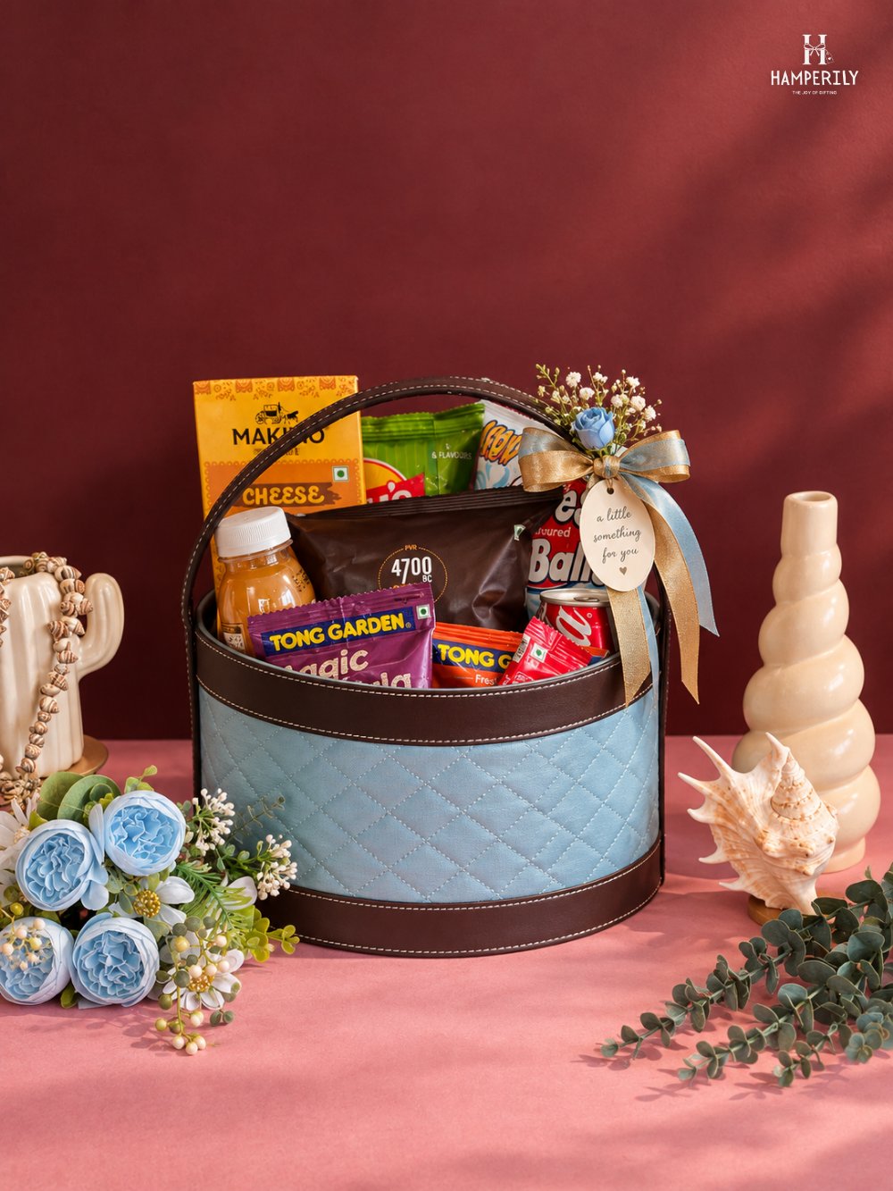Quilted blue leather basket hamper