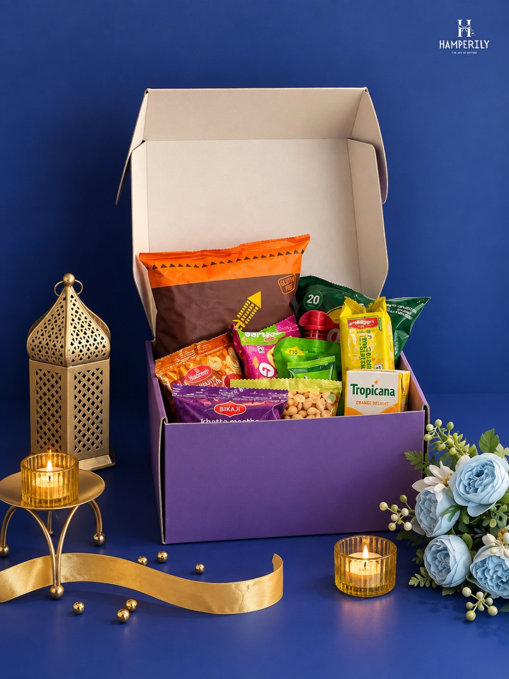Purple festive gift box hamper with snacks